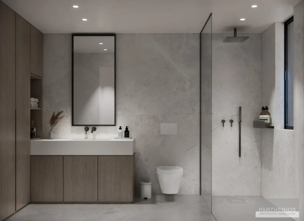 Minimal bathroom with large-format stone tiles, walk-in shower and floating timber vanity