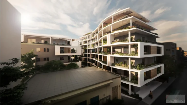 Platonos Gardens apartment building with terraced white balconies and planted roof gardens at sunset in Chania, Crete