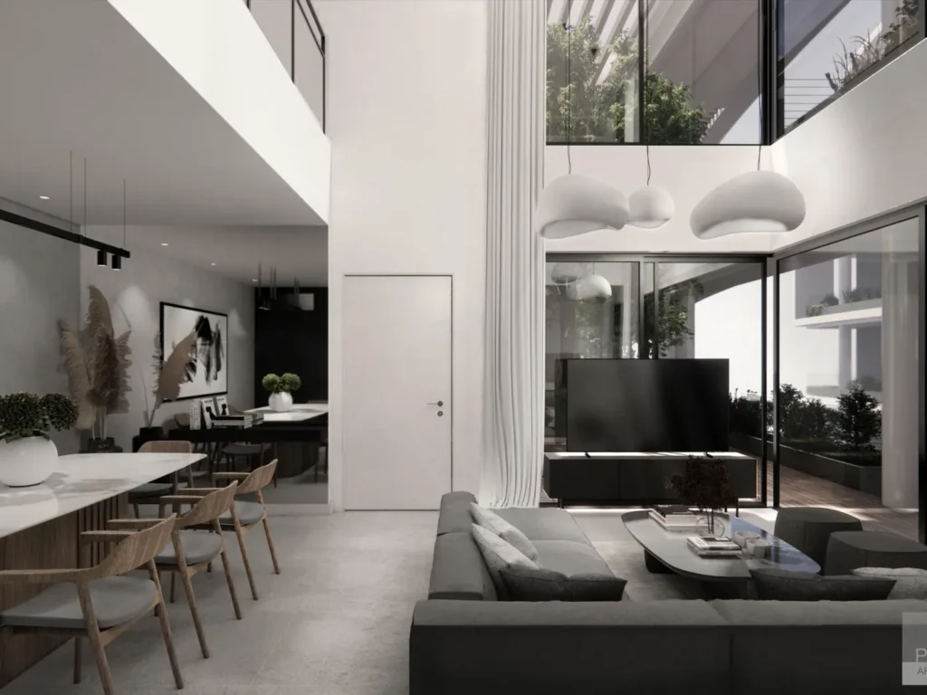 Double-height penthouse living space with gallery level and large windows